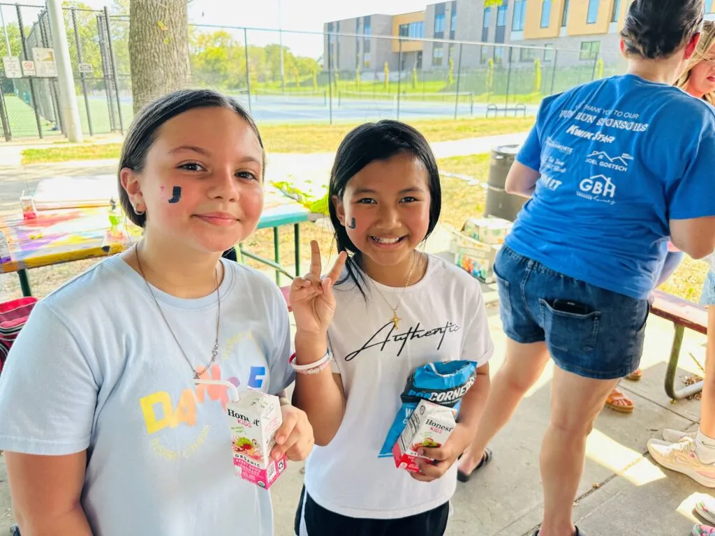 Valerius Homecoming Fun Run Students smiling