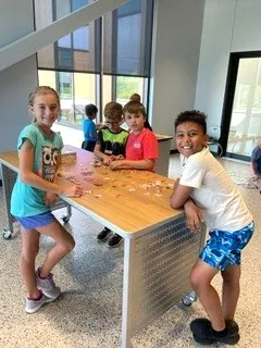 Valerius students working on a project together